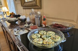 Breakfast buffet, mini frittata, bacon, yogurt and hard boiled eggs